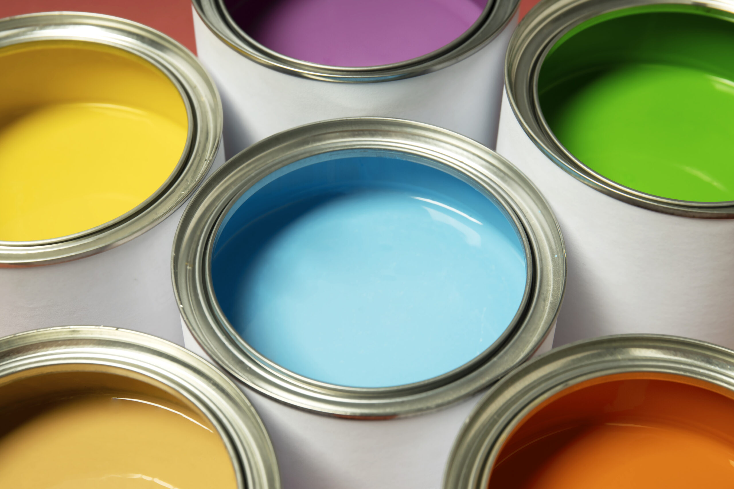 high-angle-colorful-paint-cans
